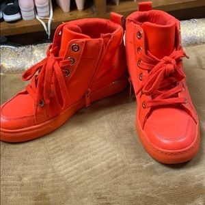 Red Aldo hightop sneakers